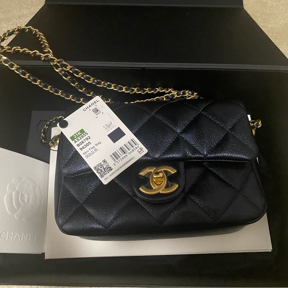 New with tag CHANEL Black Quilted Caviar Mini Flap Bag with Gold Hardware